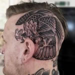 Traditional black work eagle, free handed and tattooed on the side of a head by Antony Dickinson on Chris Chambers of Altar Skateshop Dartford. Tattoo by northernbuilt