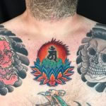 Bright, colourful lotus and bonji japanese style tattoo with skull and hannya chest plates tattooed by Aaron Hewitt at Cult Classic Tattoo in Romford, Essex just outside of London