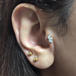 Curated ear with Swarovski crystals by Joe Espin of Mala Piercing