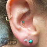 Luxury piercing by Joe Espin, APP affiliated piercer at Cult Classic Tattoo in Romford, Essex just outside of London. Curated ear.