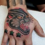 A traditional, Classic and old school panther tattooed on the hand by Antony Dickinson