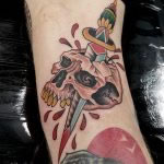 Traditional skull and dagger in full colour. The tattoo sits in the back of the knee, stretching up to the thigh by Antony Dickinson northernbuilt