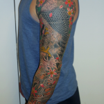 Traditional Japanese Hawk and Koi full sleeve. Covering laser tattoo removal by Joe Espin and tattooed by Aaron Hewitt, both at Cult Classic Tattoo in Romford, Essex. 15 minutes from London Liverpool Street.